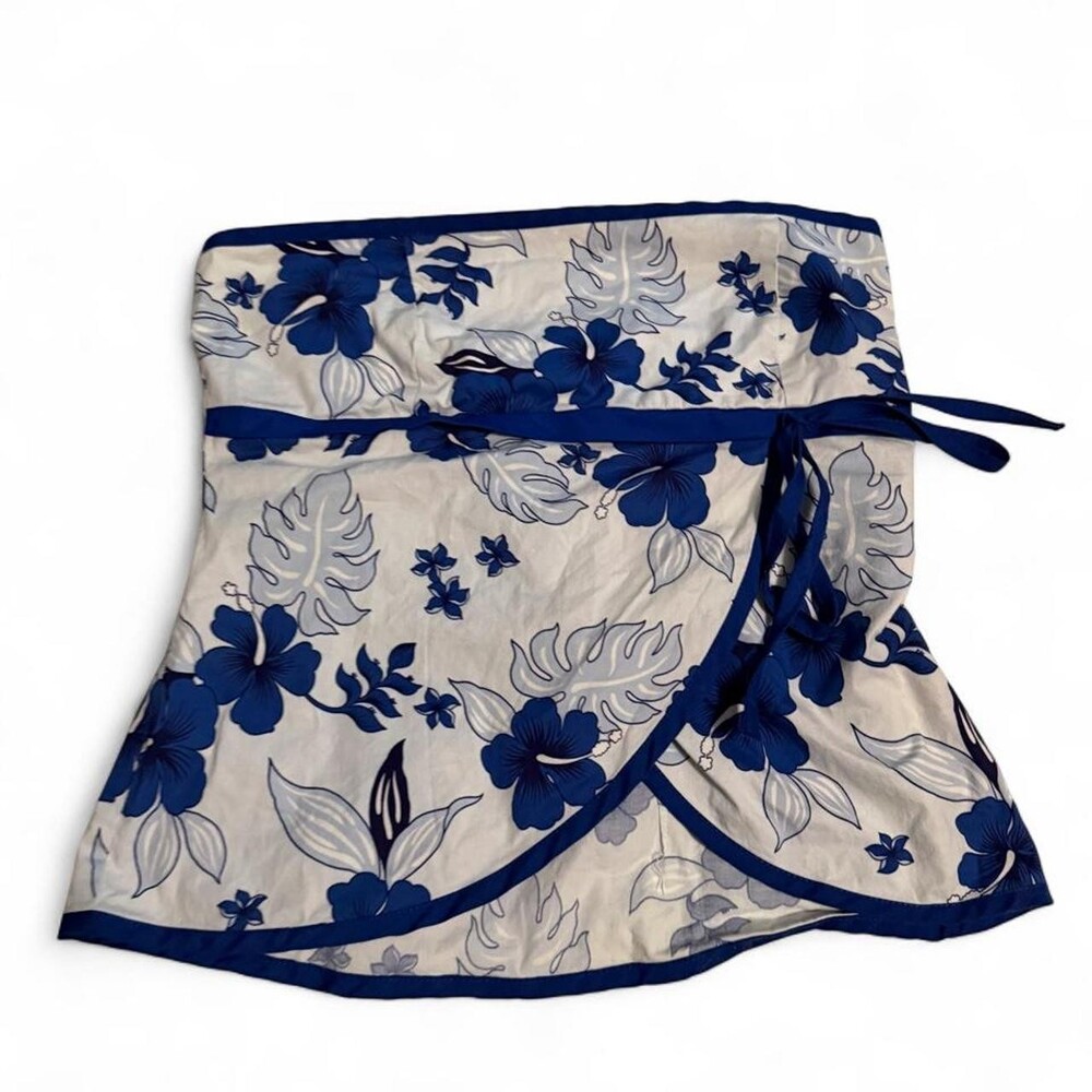 Hanua blue floral strapless top with white background and blue hibiscus flowers